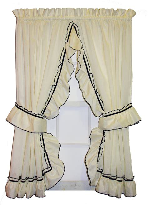 White with small flowers, lined valance and swag. . Country ruffled curtains